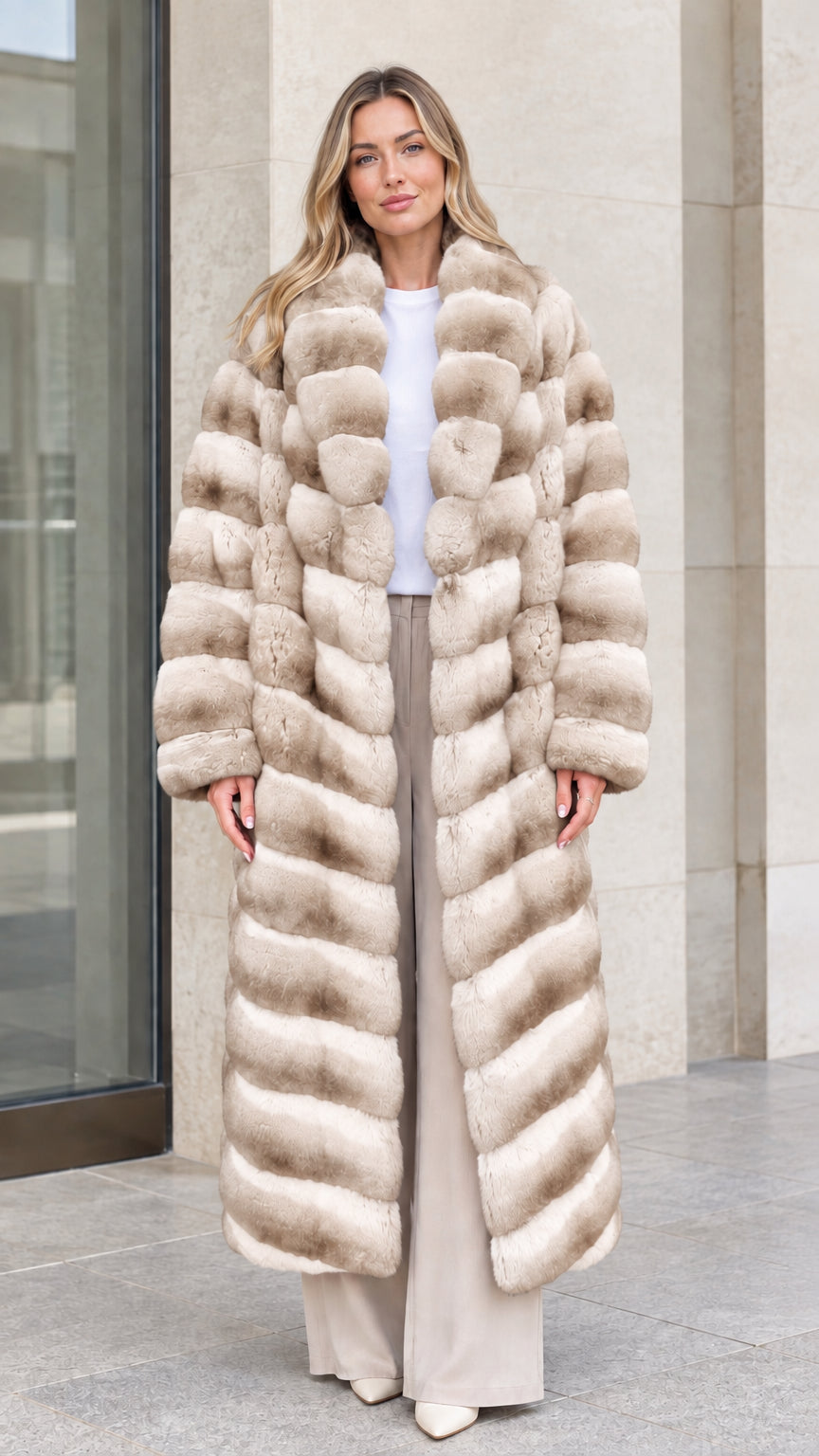 Model wearing Champagne Beige full-length tiered plush faux fur maxi coat