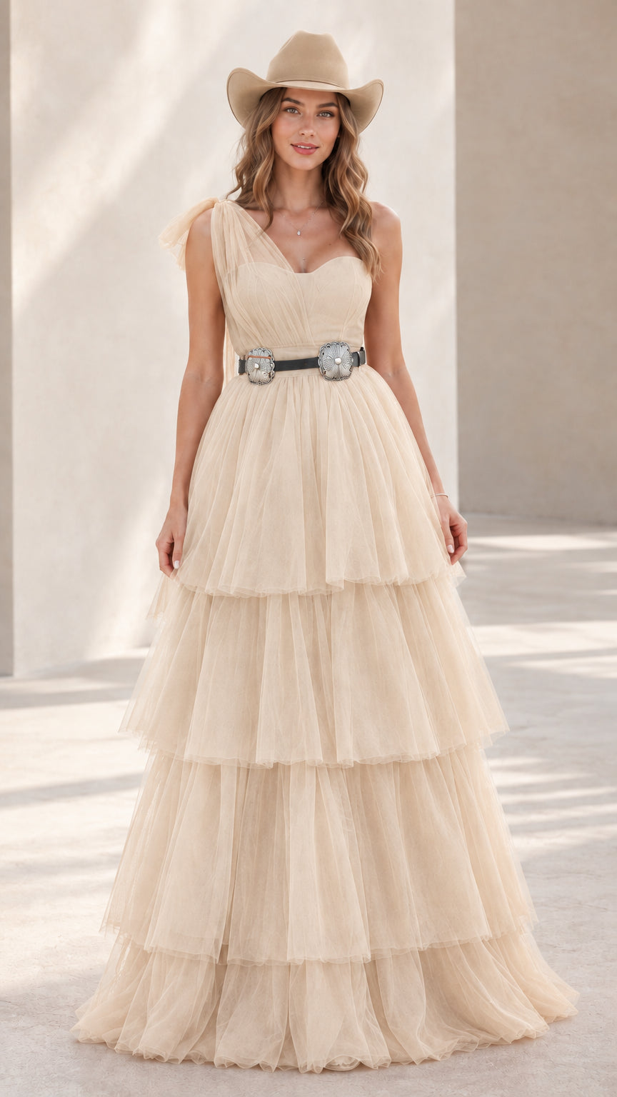 Model wearing champagne cream one-shoulder tiered tulle formal dress