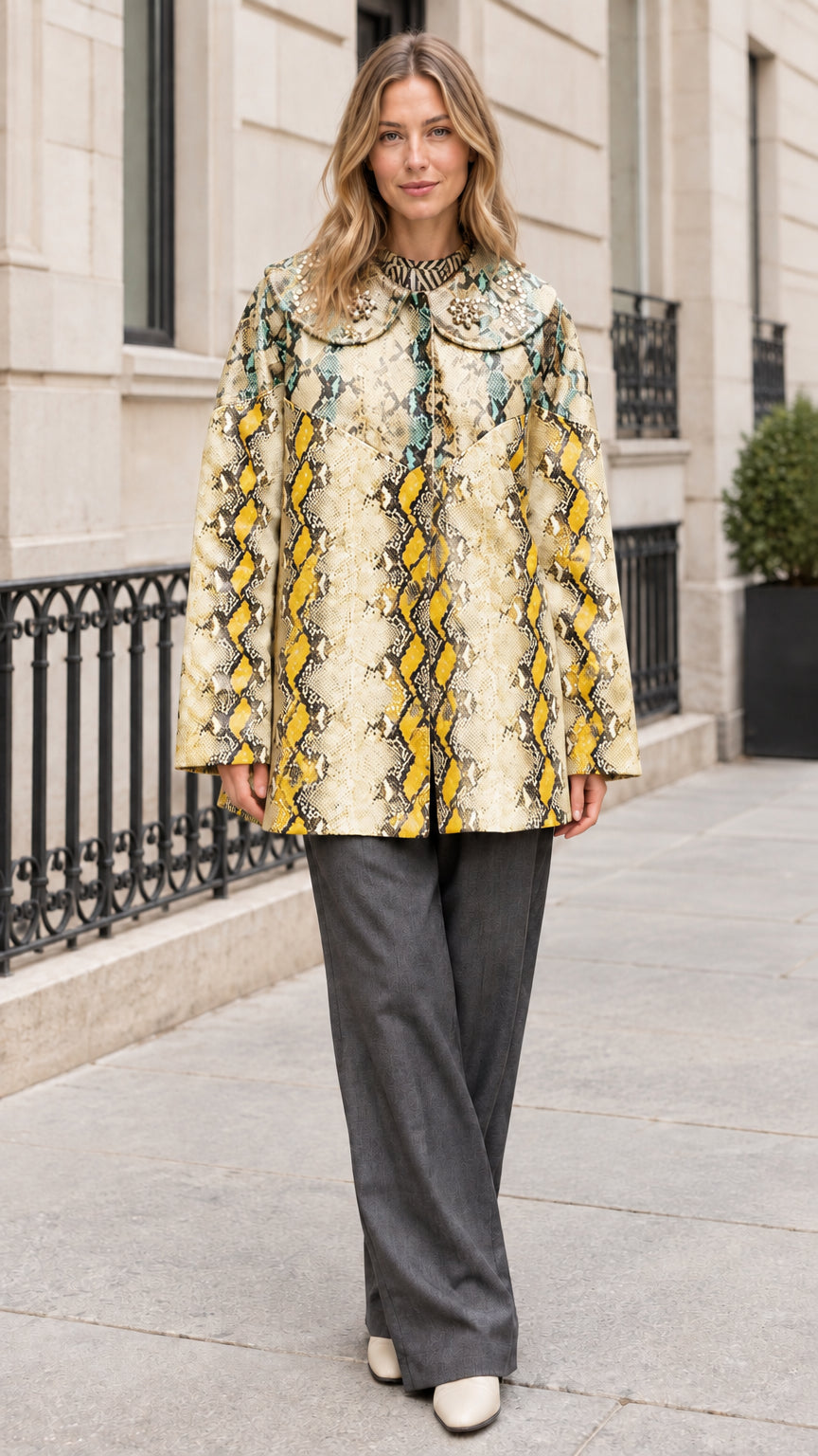 Model wearing Light Yellow snakeskin print coat