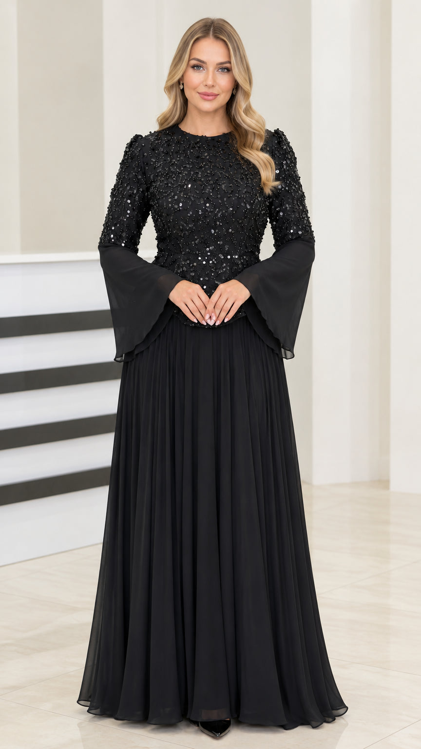 Front view of black sequin bodice long bell sleeve chiffon maxi evening gown