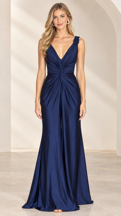 Front view of model wearing Navy Blue V-neck ruched satin evening gown with shoulder rosette