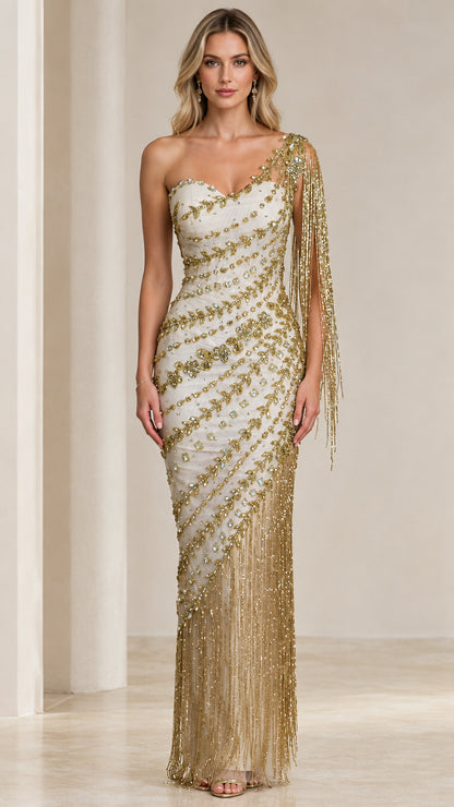 Front full-length view of model wearing Ivory Gold one-shoulder beaded fringe evening gown