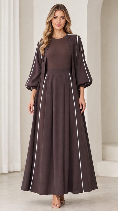 Front view of woman wearing Coffee Brown contrast piping lantern sleeve maxi dress
