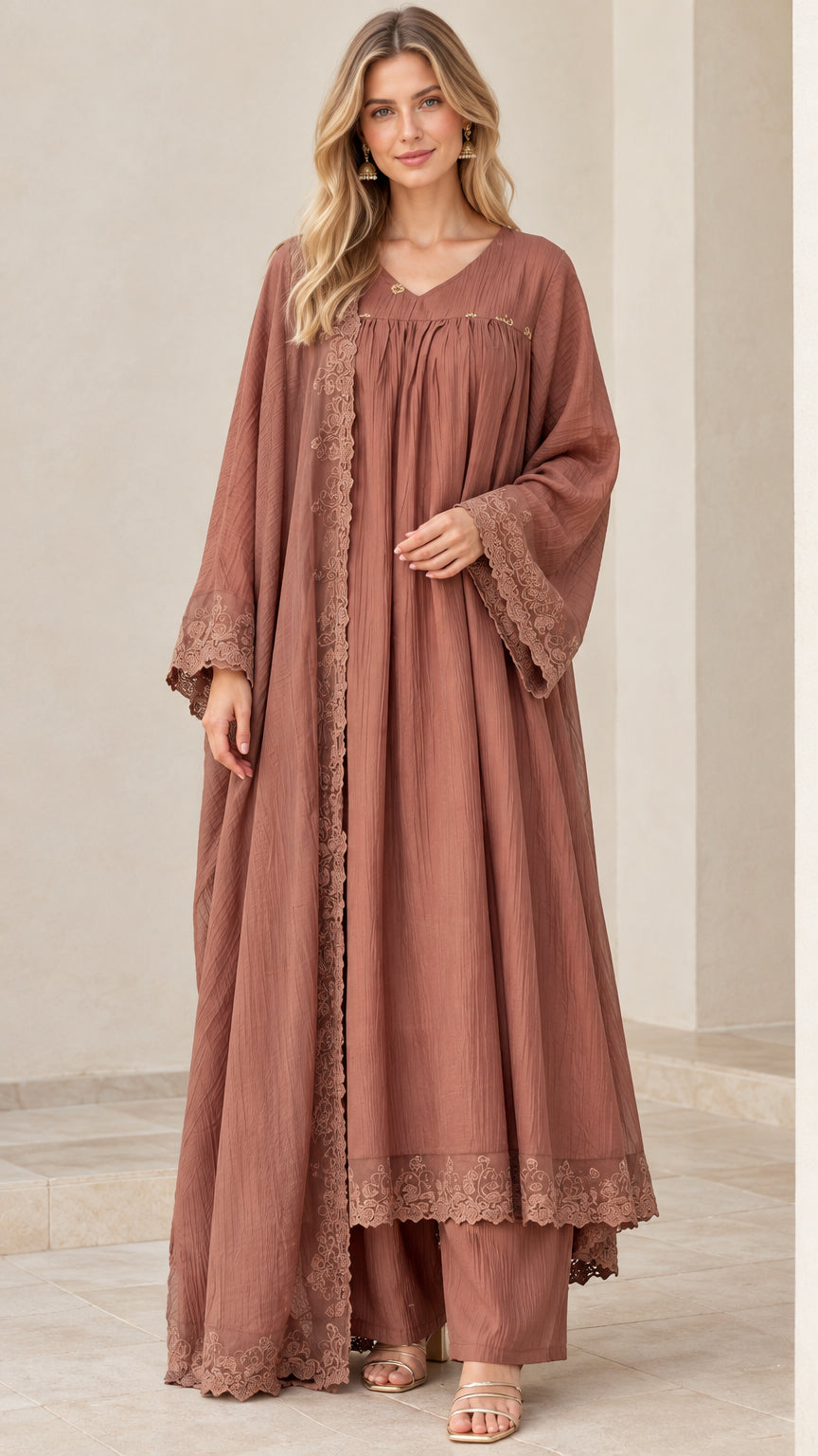 Front full-length view of model wearing dusty rose 3-piece abaya set with lace trim