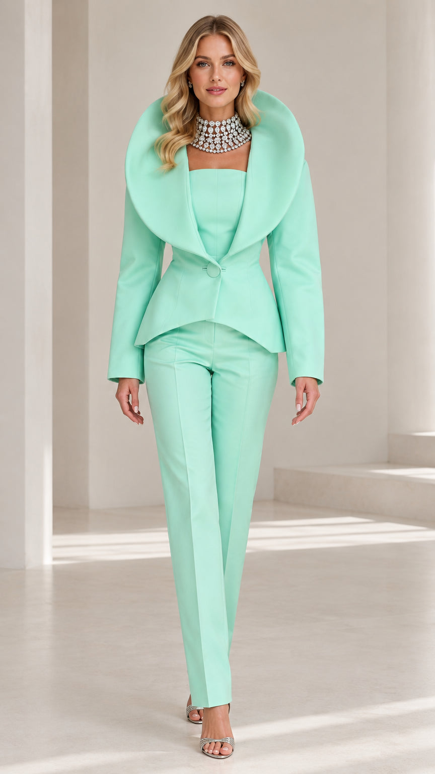 Front view of model wearing Mint Green sculpted shawl collar suit set with necklace and heels