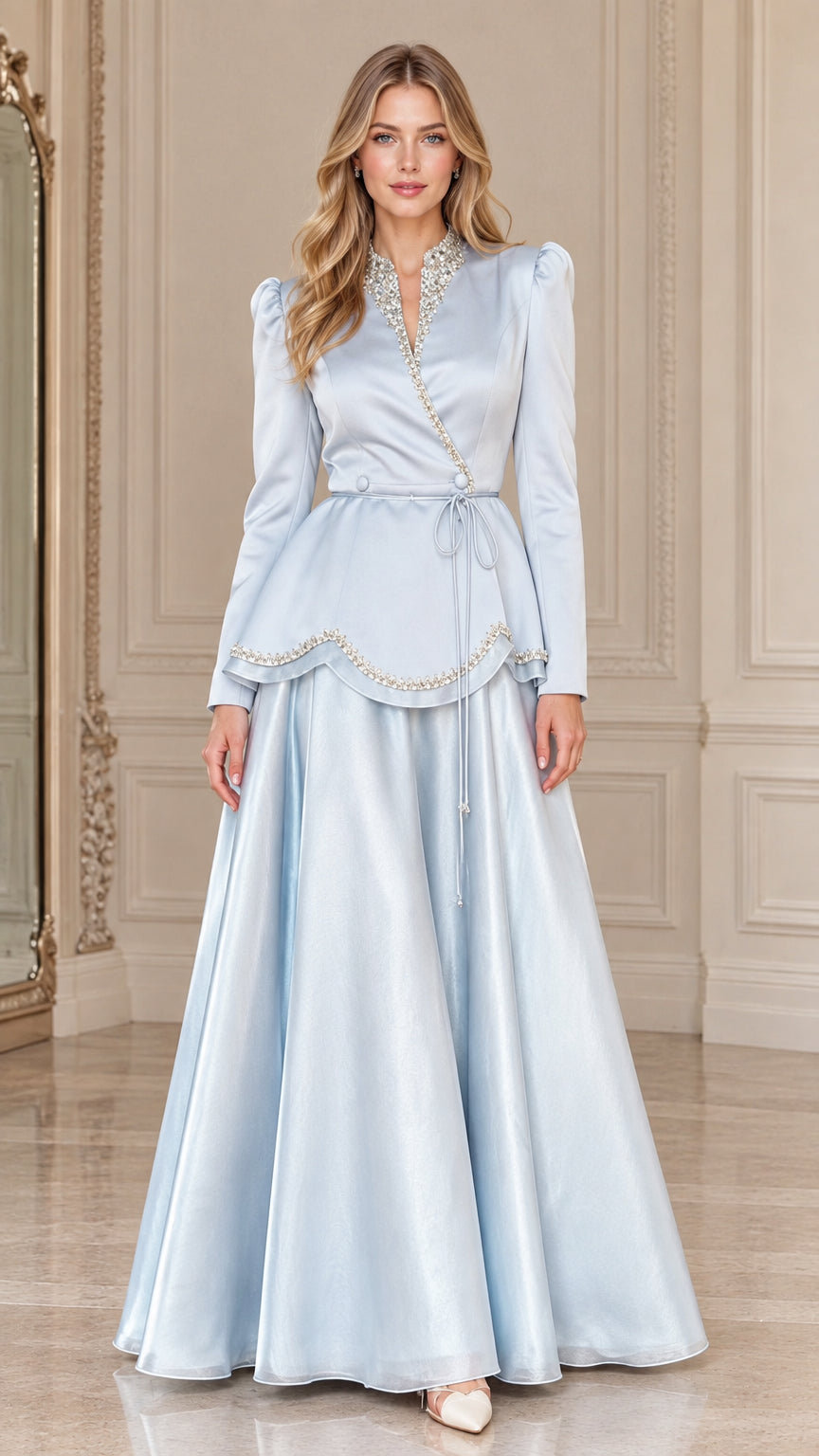 Front view of Ice Blue rhinestone embellished long sleeve peplum maxi gown