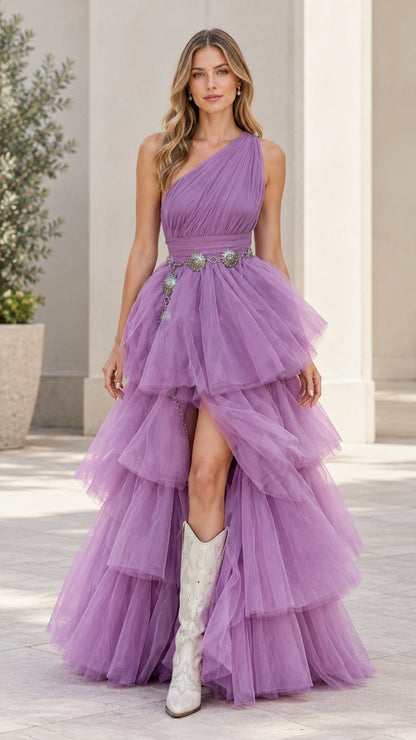Front view of model wearing lavender one-shoulder tiered tulle maxi dress with slit