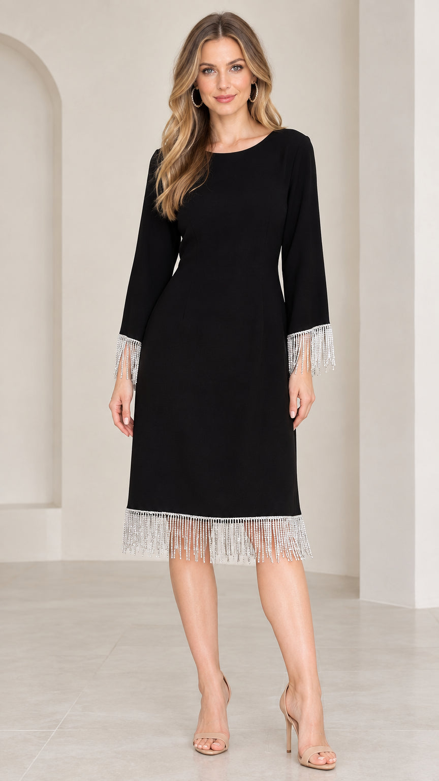Front view of black knee-length dress with rhinestone fringe hem and sleeves