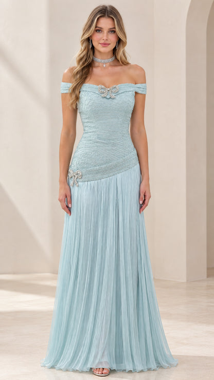 Front view of woman wearing ice blue off-the-shoulder pleated evening gown with beaded bow accents