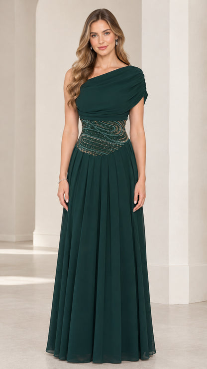 Front view of model wearing emerald green one-shoulder draped chiffon maxi dress with beaded waist