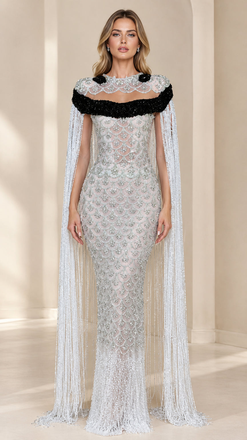Front view of model wearing Silver Embellished Fringe Cape Evening Gown