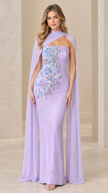Front view of lavender floor-length evening gown with 3D floral appliqué and attached sheer cape