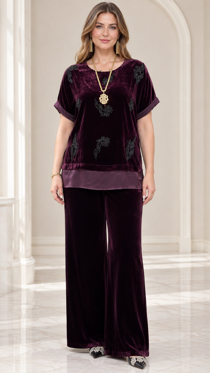 Full front view of model wearing Plum beaded velvet short sleeve top and wide leg pants set