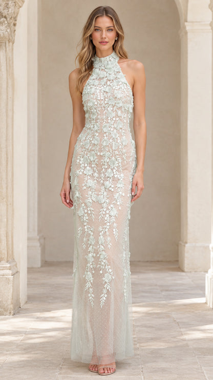 Front view of model wearing Sage Green 3D floral applique halter neck maxi evening gown