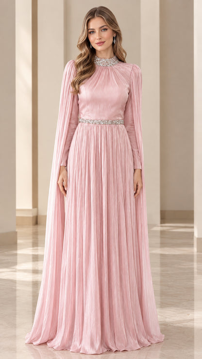 Full-length front view of blush pink pleated evening gown with rhinestone neckline and cape sleeves