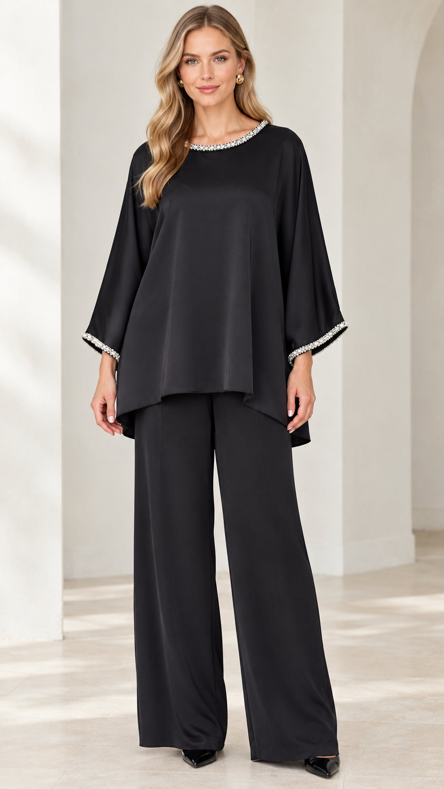 Front view of woman wearing Black embellished tunic top and wide-leg pant set
