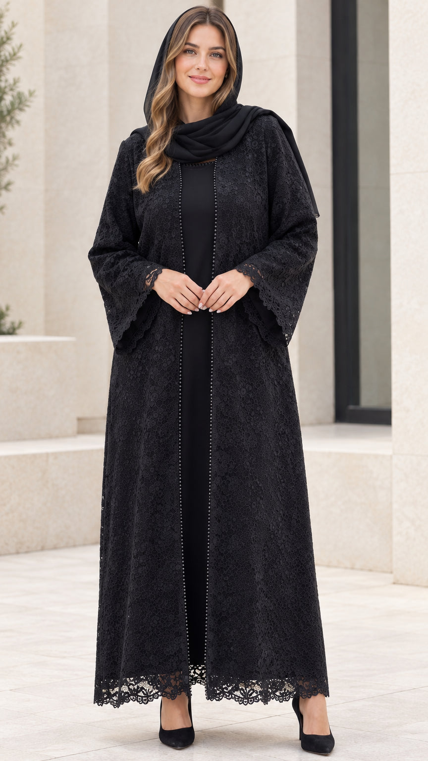 Front full view of women's black floral lace overlay abaya set with matching hijab