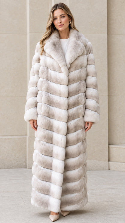 Front full-length view of model wearing Light Gray chevron maxi faux fur coat