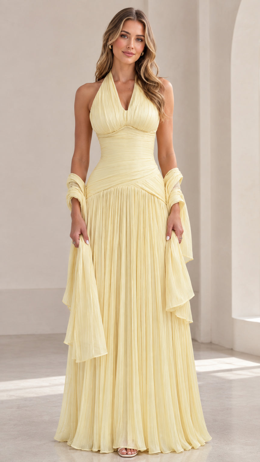 Front view of Butter Yellow halter ruched pleated maxi gown with matching shawl