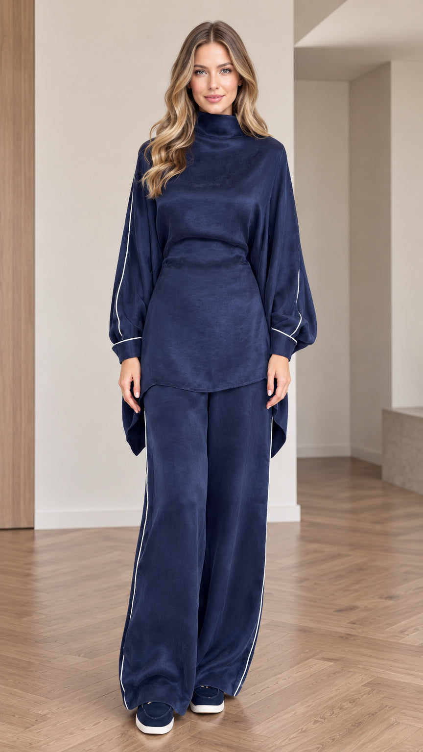 Full front view of women's navy blue mock neck tunic top and wide leg pants set with white piping
