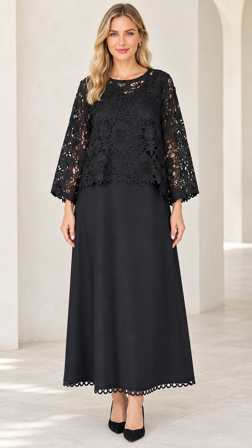 Front view of model wearing Black floral lace overlay maxi dress with flared sleeves