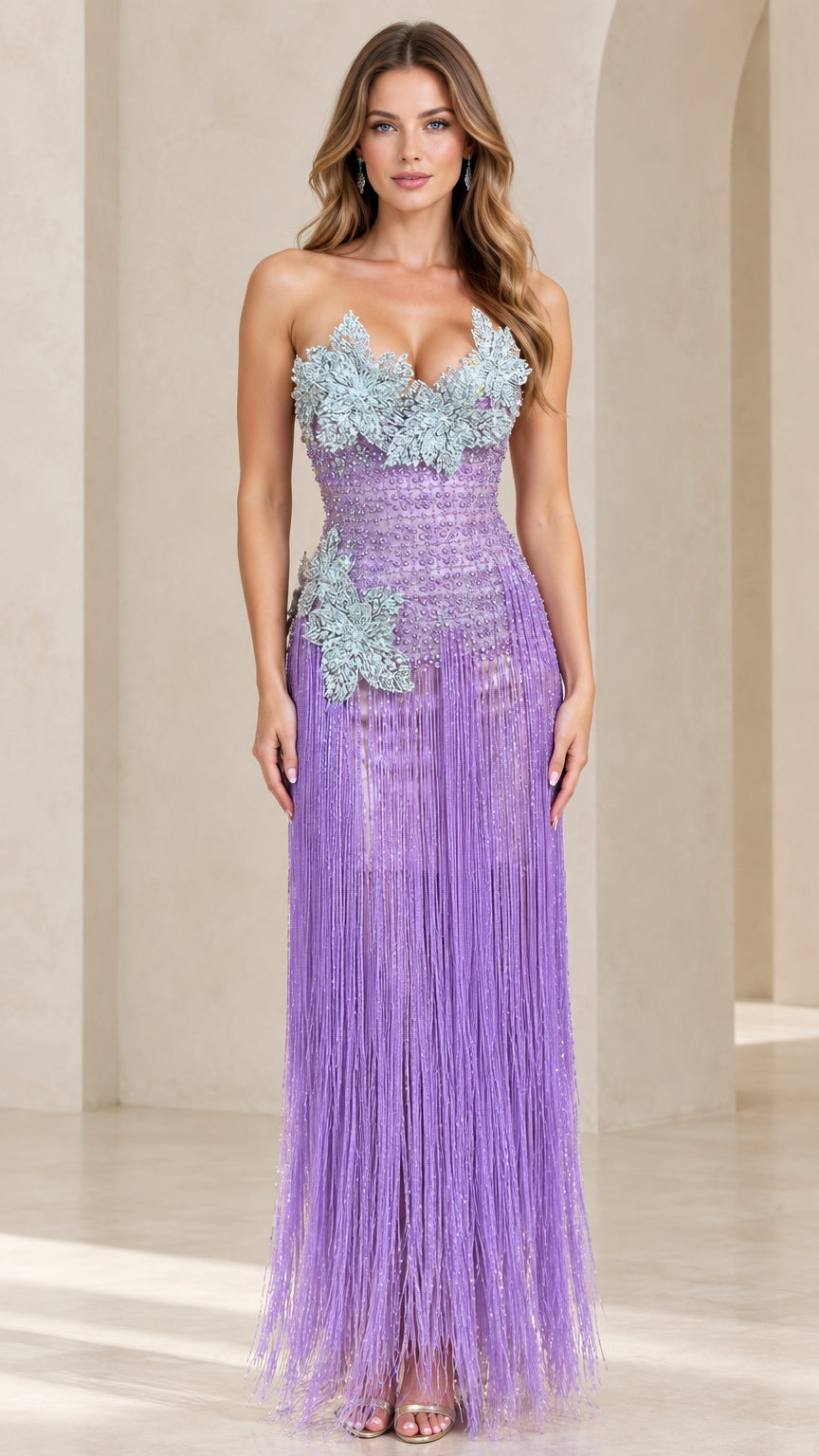 Front view of model wearing lavender strapless 3D floral applique fringe maxi evening gown
