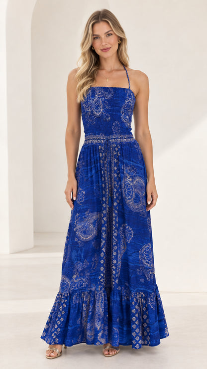 Front full-length view of royal blue boho printed smocked maxi dress