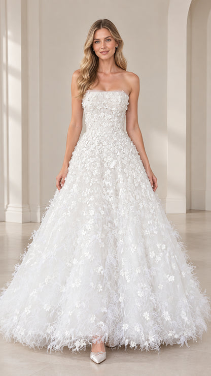 Front view of model wearing strapless white 3D floral applique ball gown