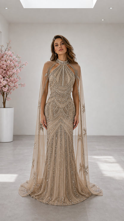 Champagne sequined halter neck mermaid evening gown with attached sheer cape front view