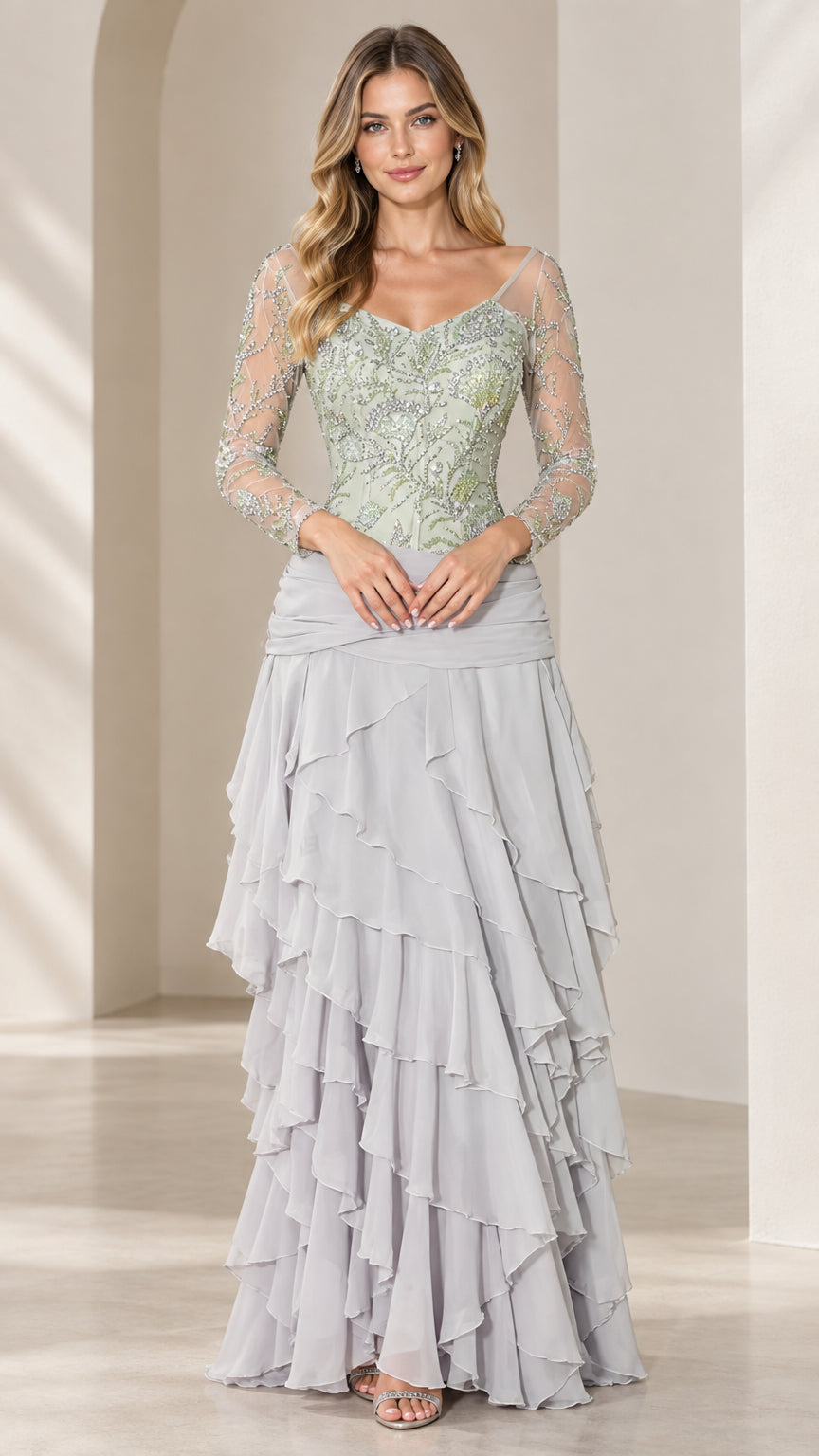 Front view of Sage Green beaded bodice long sleeve evening gown with tiered skirt