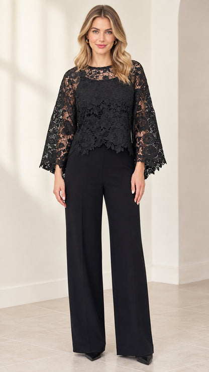 Front view of black floral lace overlay wide-leg jumpsuit on model