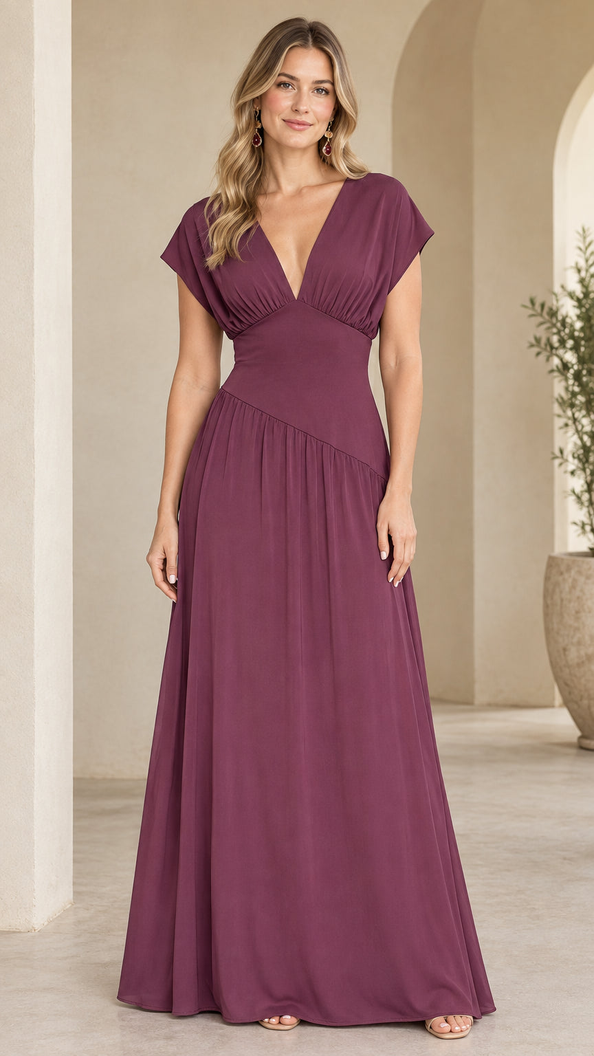 Front view of model wearing plum pleated V-neck cap sleeve maxi dress