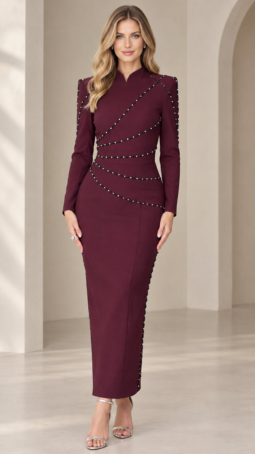 Front full-length view of model wearing burgundy long sleeve beaded column maxi dress
