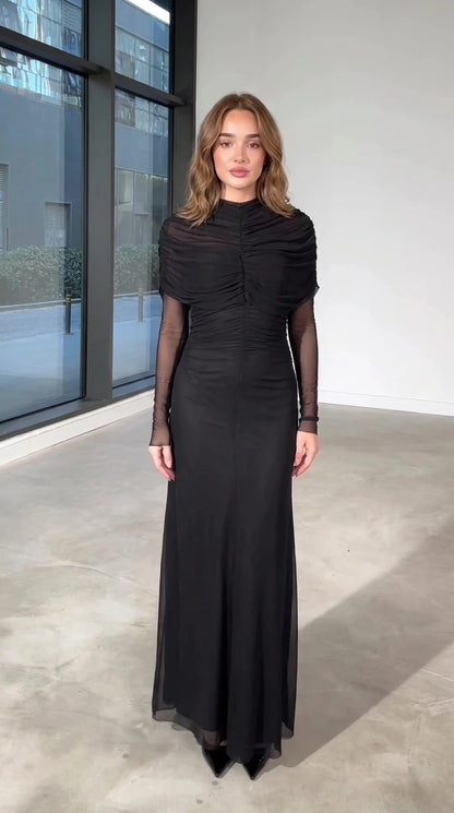 Front view of black ruched mock neck mesh long sleeve maxi dress