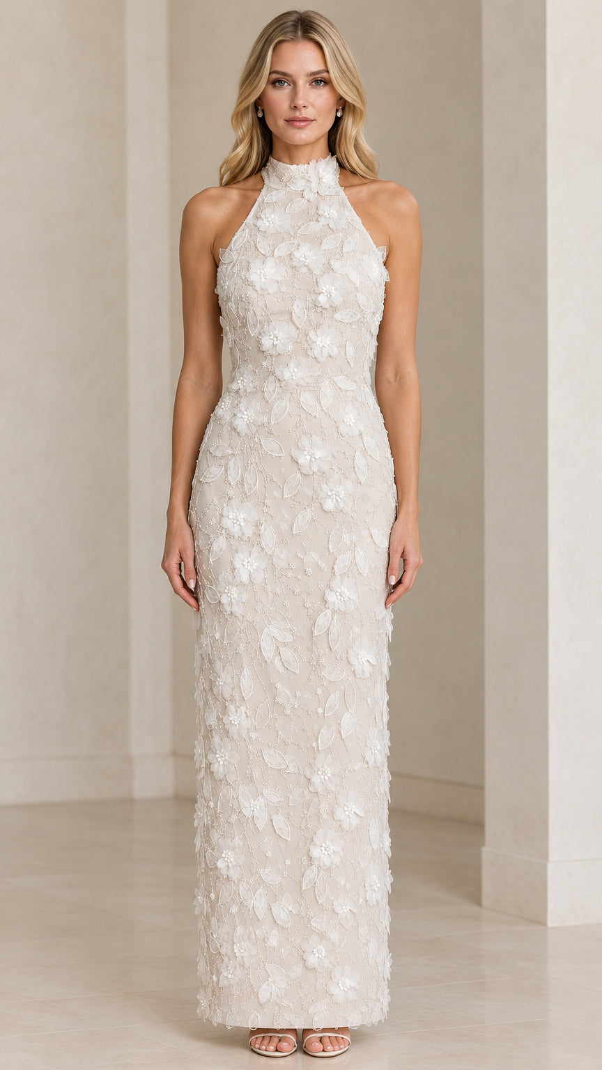 Front view of model wearing Ivory 3D floral applique halter maxi evening dress