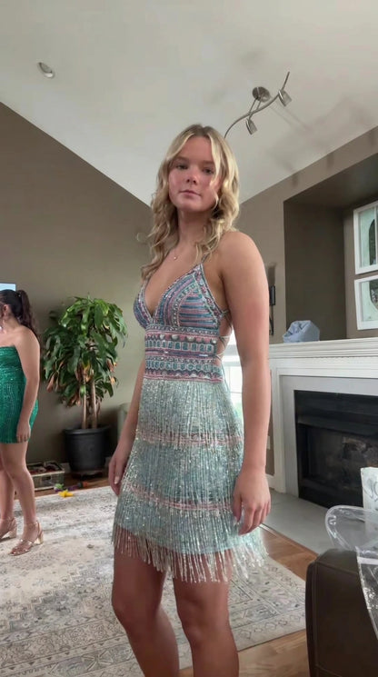 Front three-quarter view of aqua blue beaded sequin fringe mini dress