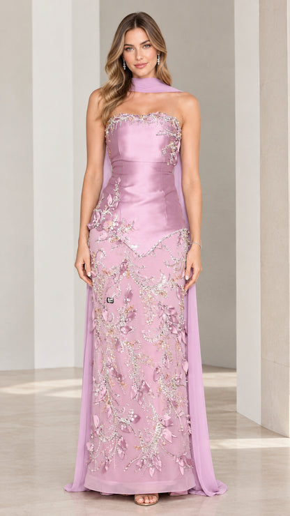 Front view of model wearing lilac strapless beaded embroidered evening gown with chiffon neck scarf
