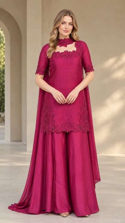 Front full-length view of model wearing magenta embroidered tunic and wide-leg palazzo set with scarf