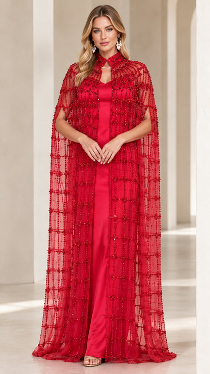 Front view of red formal evening gown with beaded sheer cape overlay