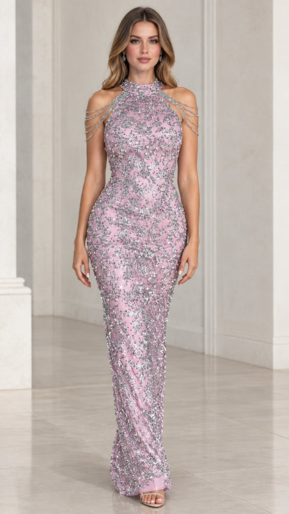 Front view of woman wearing pink sequin halter evening gown with draped shoulder chains