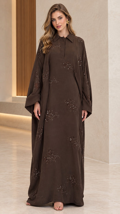Front full-length view of woman wearing brown collared sequin embellished abaya maxi dress
