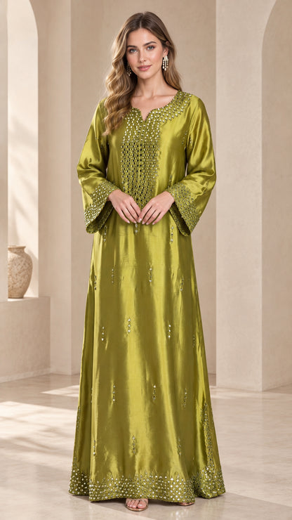 Front view of model wearing an olive green embellished satin kaftan maxi dress