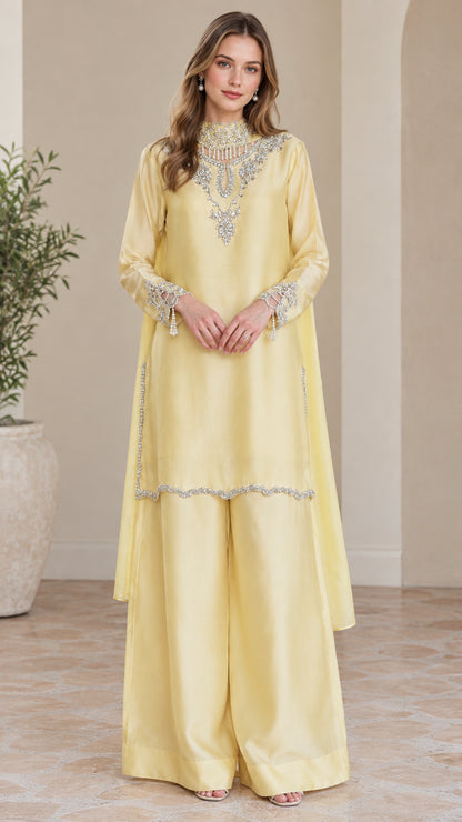 Front full view of pale yellow long tunic and wide leg pants set with crystal embellished neckline