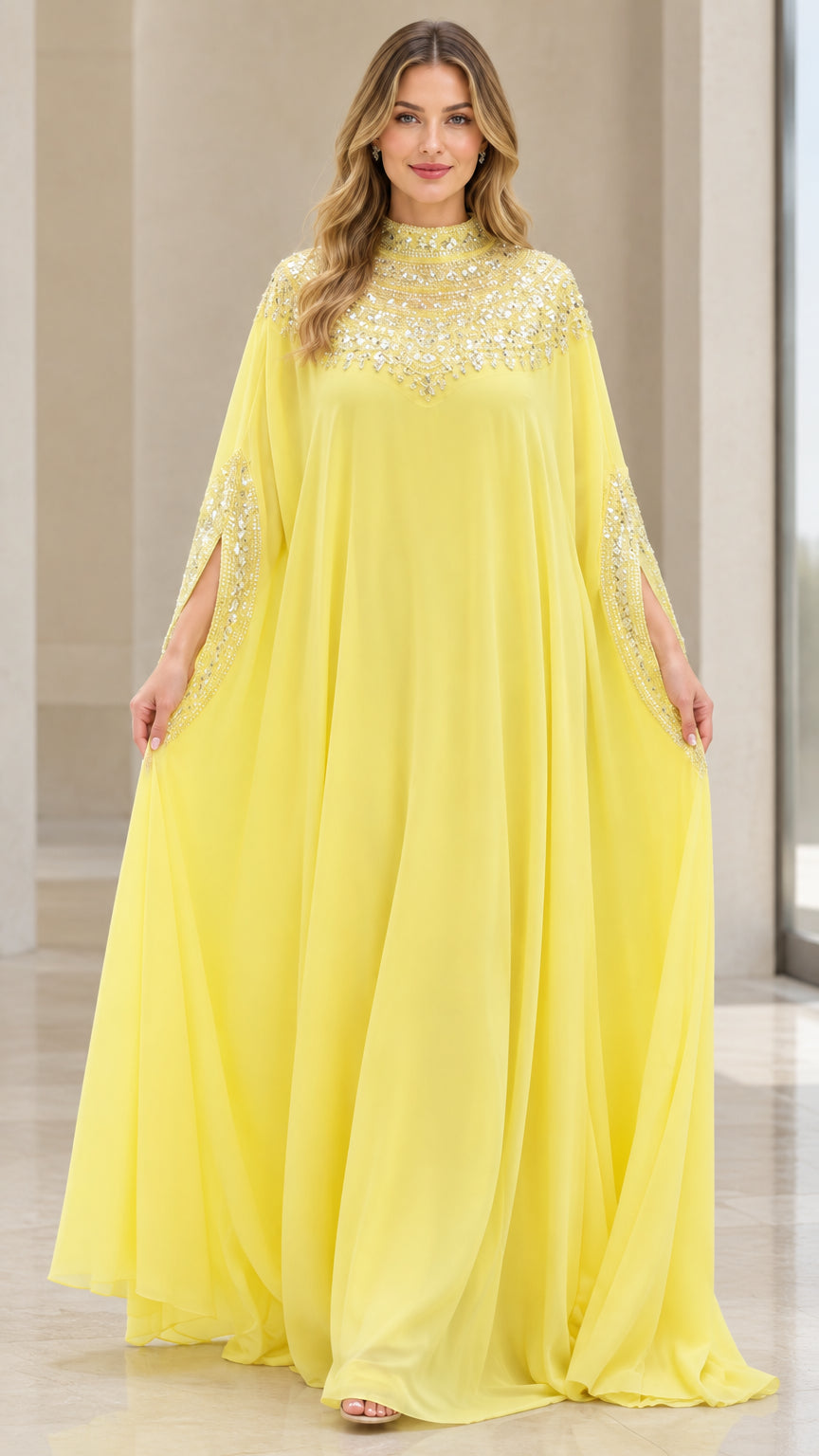 Front view of model wearing a bright yellow high neck beaded cape kaftan maxi dress