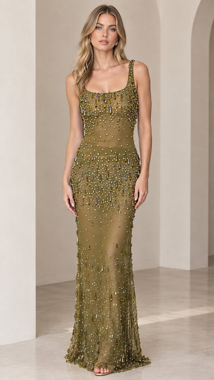 Front view of woman wearing an olive green square neck beaded column maxi dress