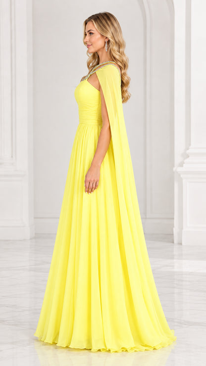 Side view of yellow formal gown showing dramatic drape of the attached cape