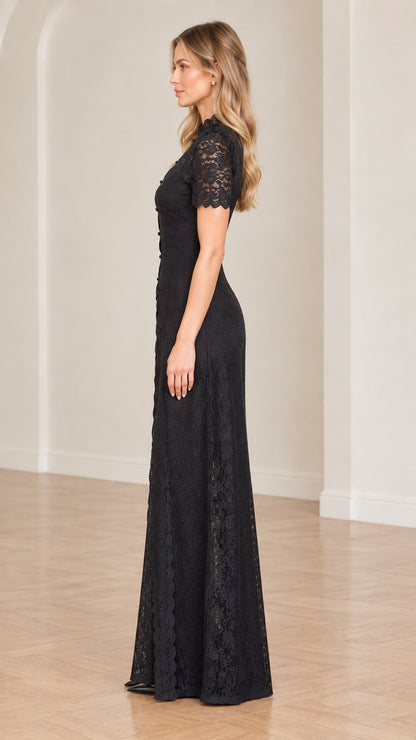 Side full-length view of black lace evening jumpsuit showing tailored silhouette