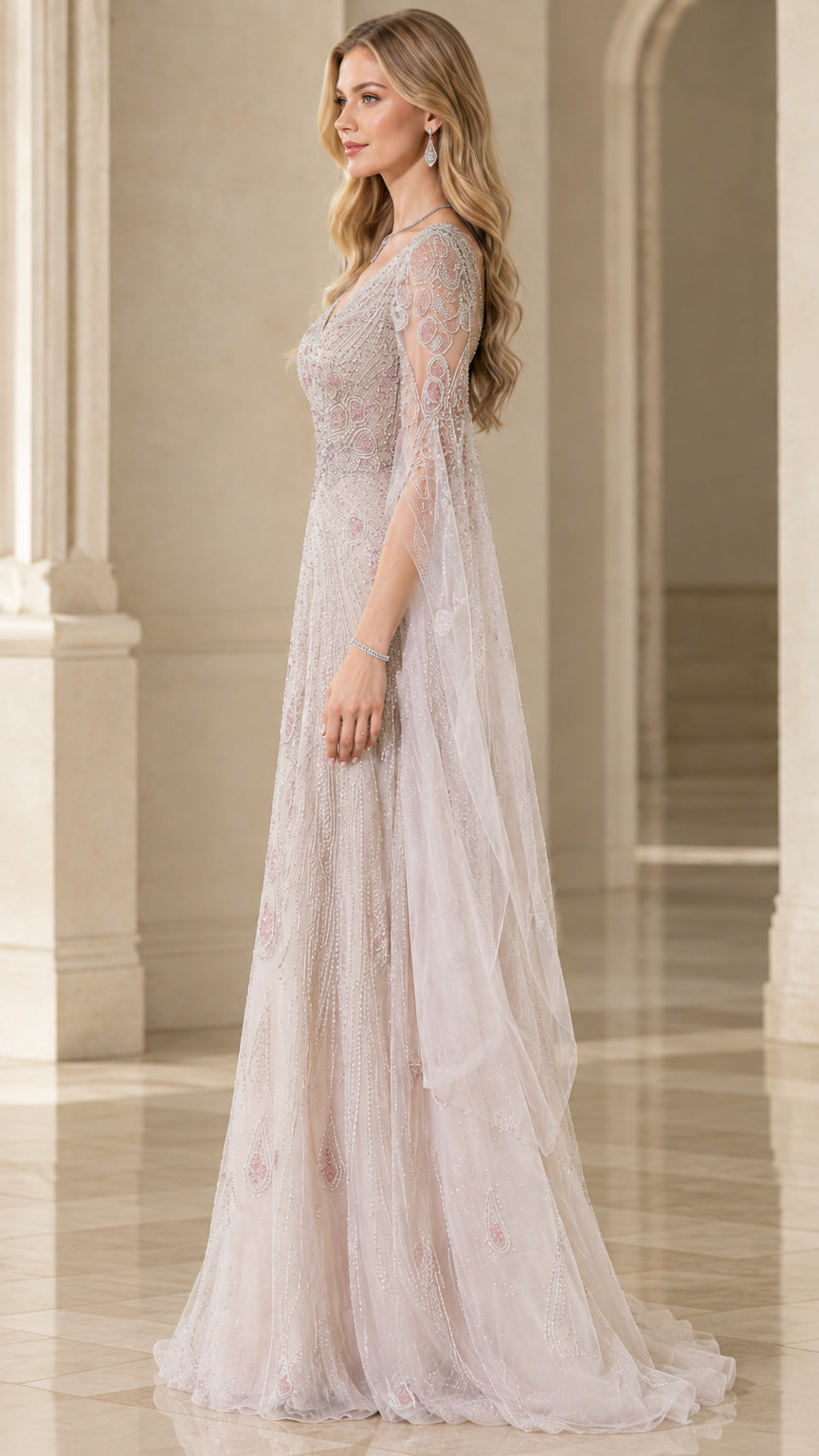 Side profile view of champagne embellished formal gown showcasing long split sleeves