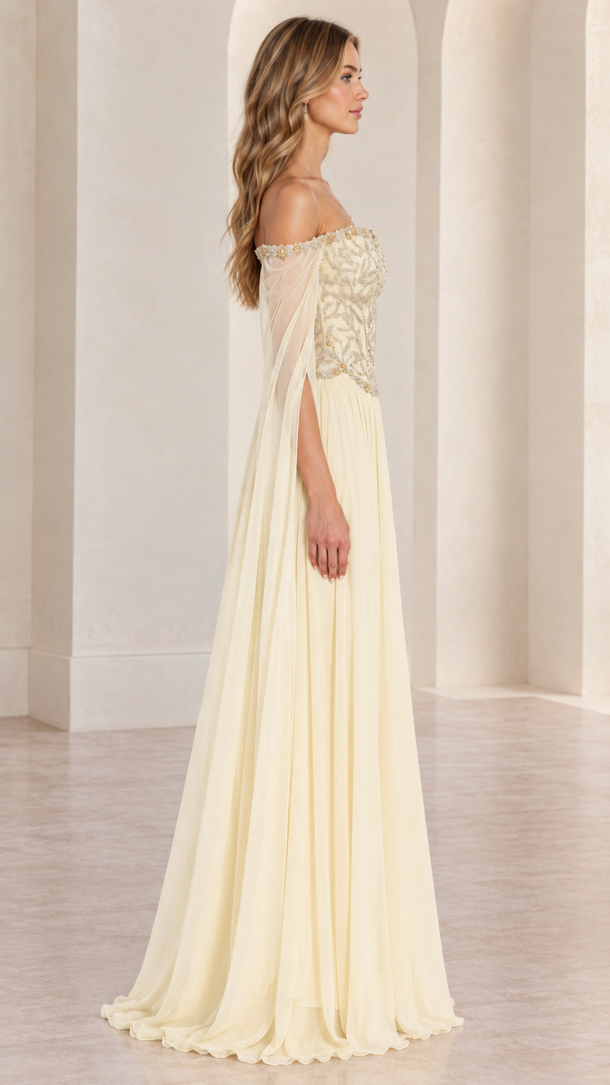 Side profile of Champagne formal evening dress showing flowing A-line chiffon skirt