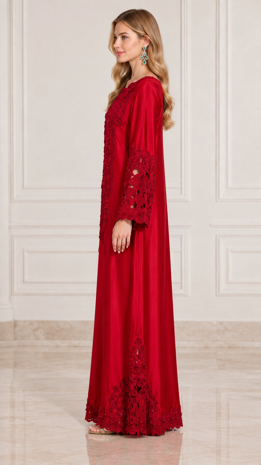Side profile of model wearing red satin kaftan dress showing sleeve drape and length